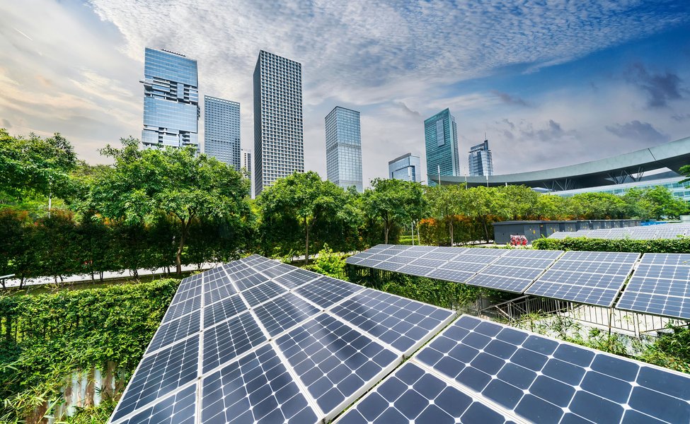 stock-photo-ecological-energy-renewable-solar-panel-plant-with-urban-modern-building-landscape-landmarks-1382241812.jpg